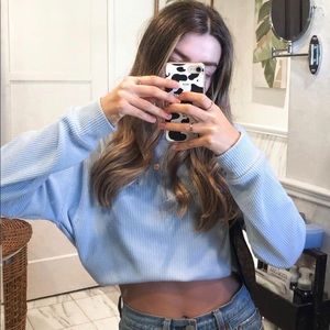Light blue cropped long sleeve sweater top